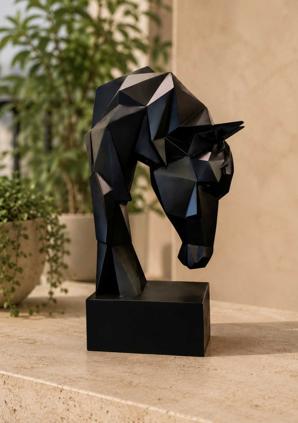 Aravalii Space Horse Head futuristic resin sculpture with a geometric black finish on a sleek office desk"