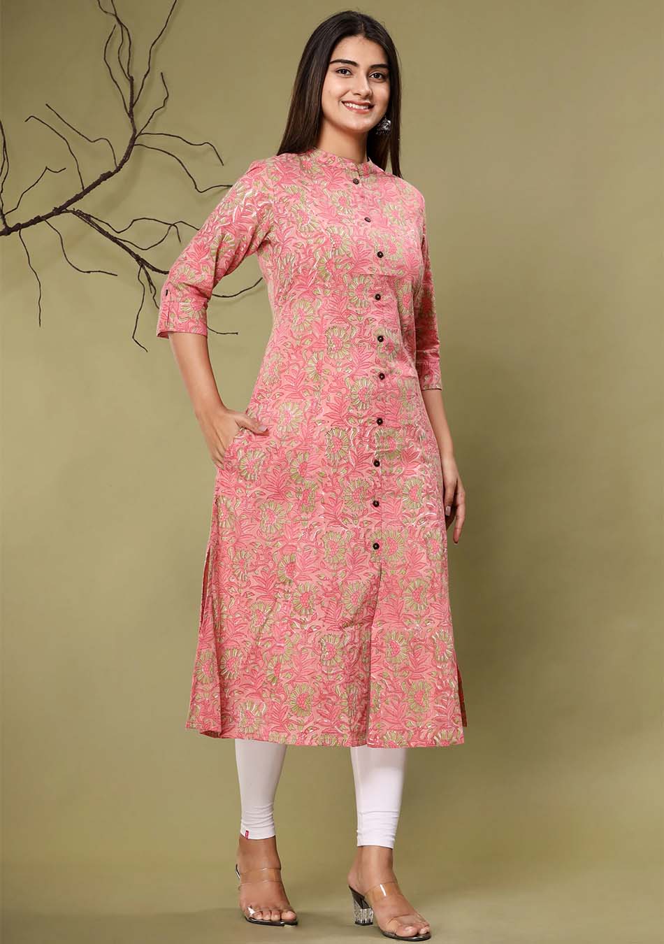 Pink kurta showcases intricate floral print