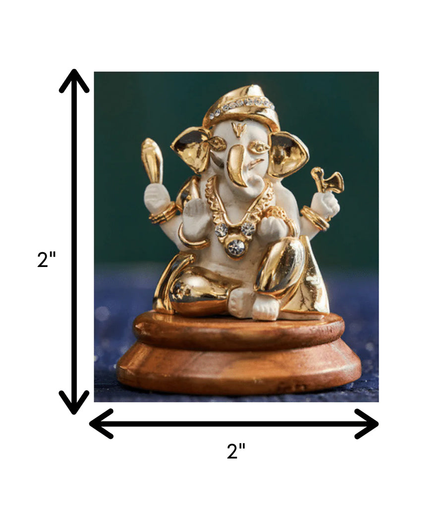Golden Four-Armed Ganesha