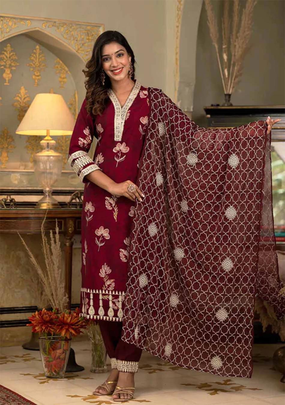 Red ruby Muslin silk Ensemble with Intricate Zari Dupatta